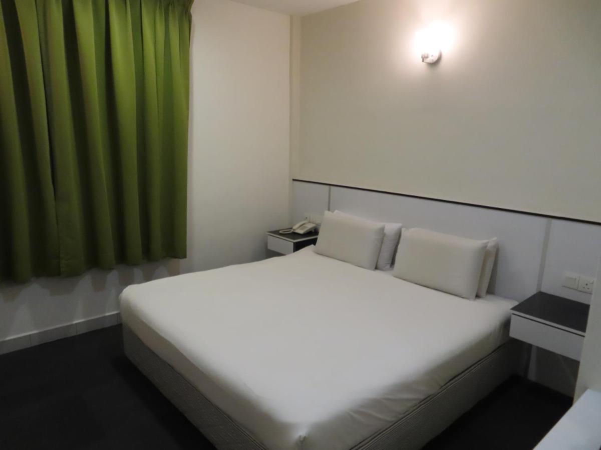Akar Hotel Kampung Baru Куала-Лумпур Экстерьер фото